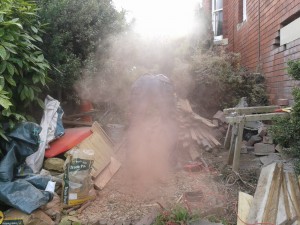 Brick cutting: I hope he is wearing a face mask